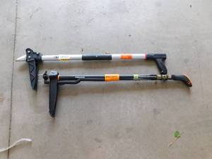 lot 40 image: (2) 34 in. Stand up 4 Claw Long Handle Weed Puller Tool Heavy Duty Garden, Lawn and Dandelion Weeder, Easy-Eject No Bending