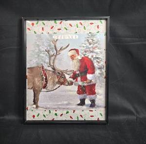 lot 115 image: Framed Santa and Reindeer Holiday Artwork 20 x 16