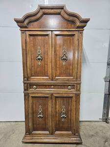 lot 144 image: Antique Wooden Armoire with Brass Accents and Drawers