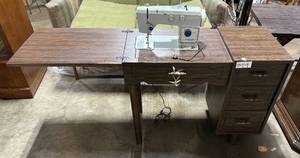 lot 147 image: Vintage Signature Sewing Machine with Integrated Wood Cabinet
