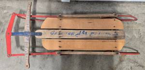 lot 180 image: Vintage Wooden Snow Sled with Red Metal Runners