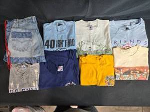lot 216 image: Collection of Mixed Graphic T-Shirts and Denim Skirt