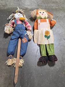 lot 222 image: Pair of Decorative Scarecrow Dolls with Sunflower Accents
