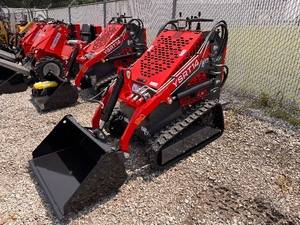 lot 10 image: Stand On SkidSteer Loader