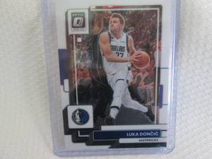 lot 65 image: 2022-23 Optic Luka Doncic Card...