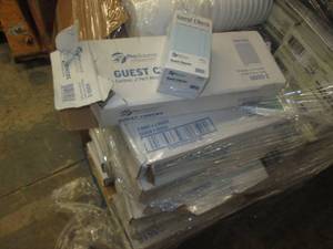lot 300 image: Many boxes of new guest checks, perfect for a restaurant or retail business