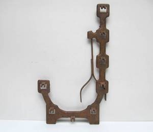 lot 66 image: Antique Cast Iron General Store J-Shaped Rack Stand
