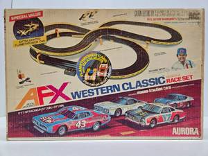 lot 209 image: Vintage Aurora AFX Slot Car Set wCars - Western Classic Race Set