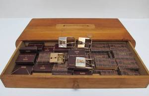 lot 107 image: Awesome Original 1950s era SWANK Store Display Case Full of NOS Pearlized Brass Buckles