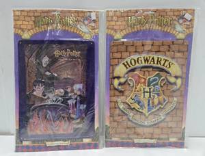 lot 250 image: 2 Brand New Sealed HARRY POTTER Embossed Metal Display Signs