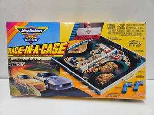 lot 252 image: Retro 90s MICRO MACHINES Race-in-a-Case Playset