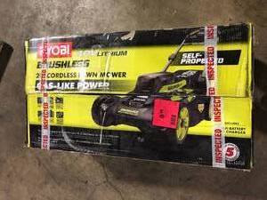 lot 25 image: RYOBI 40V HP Brushless 20 in. Cordless Electric Battery Walk Behind Self-Propelled Lawn Mower  (Battery and Charger Not Included)    Customer Returns See Pictures
