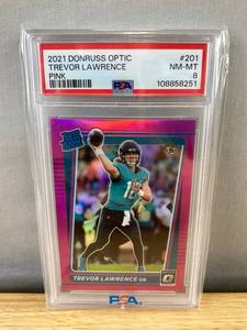 lot 235 image: 2021 Donruss Optic Trevor Lawrence Pink Rated Rookie NFL Jaguars Card - Graded PSA 8 J