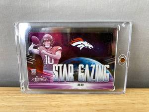lot 299 image: 2024 Panini Absolute Football Bo Nix Rookie Star Gazing Card - NFL Denver Broncos N