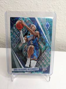 lot 437 image: Shai Gilgeous-Alexander Teal Laser Basketball Trading Card - Panini Phoenix 2023-24 M