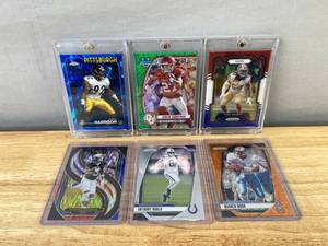 lot 806 image: NFL Football Card Lot - Numbered Sawyer, Harrison, Warner, Moon, Gould, Savage Jr. N