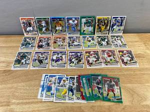 lot 812 image: 34 Donruss & Optic NFL Football Cards - Featuring Sanders, Bailey, Bettis and More Stars & Rookies J