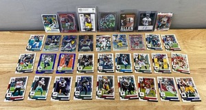 lot 813 image: NFL Football Trading Card Lot - Graded, Inserts, Burrow, Herbert, Hurts and More Rookies, Stars J
