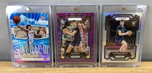 lot 838 image: PaniniHoops NBA Basketball Rookie Card Lot - Edey, Clingan, Cunningham N