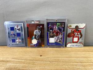 lot 260 image: 4 NFL Collectible Football Cards - Patch, Auto, Numbered J