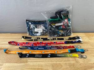 lot 70 image: Brand New NFL Team Fan Lot Lanyards, Stickers, Beanies, Gloves, and Bracelet N