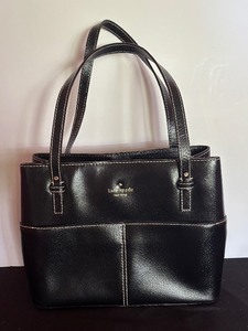 lot 100 image: Grand Street Gabriel Black Leather Handbag by Kate Spade