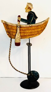 lot 90 image: Nautical Salty Dog Sky Hook Rowing Sailor Teeter Totter Tin Balance Folk Art