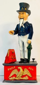 lot 85 image: Vintage Cast Iron Uncle Sam Mechanical Bank, 11.5 Inch Reproduction