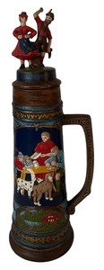 lot 210 image: Vintage Beer Stein German Origin Featuring a Figurine Design of Man and Woman with Traditional Attire