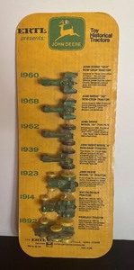 lot 260 image: New Vintage Ertl Presents John Deere 1892-1960 Tractor Set