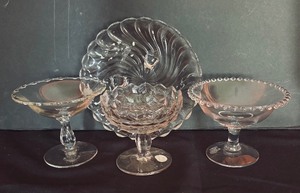 lot 353 image: Fostoria Colony Swirl Pedestal Plate, Fostoria American Cubist Compote, Fostoria Century Compote and Imperial Candlewick Compote