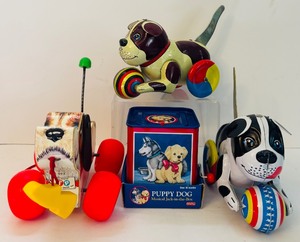 lot 220 image: Vintage Wind-Up Toys Including Fisher-Price Little Snoopy Model #693, Schylling Collector Series Dog & Ball Tim Toy and Puppy Dog Musical Hack-in-the Box by Schylling