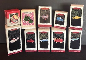 lot 500 image: Hallmark Keepsakes Ornaments including 1955 Chevrolet Camero All American Trucks, Americana Drum, Kiddie Car Classics and More