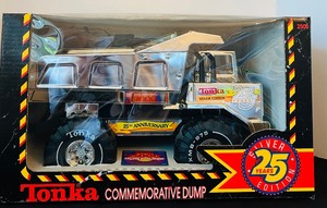 lot 35 image: Vintage 1990 Tonka 25th Anniversary Commemorative Dump Truck Silver Edition