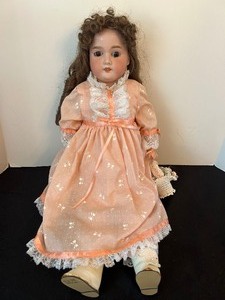 lot 37 image: Vintage Armand Marsielle Flora Dora Doll with Kid Body