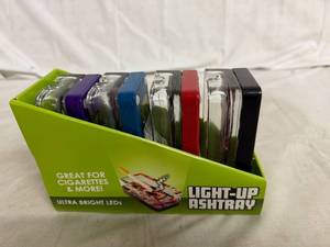 lot 35 image: 4 Pack of Light Up Ash Trays