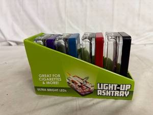 lot 36 image: 4 Pack of Light Up Ash Trays