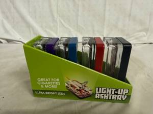 lot 37 image: 4 Pack of Light Up Ash Trays