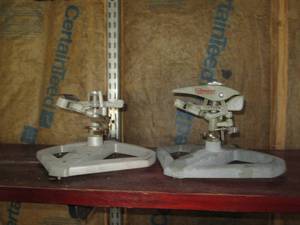 lot 119 image: Pair of metal framed lawn sprinkler...