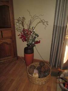 lot 21 image: Tall vase with faux floral arrangem...