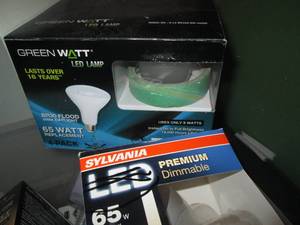 lot 39 image: Covered tote full of replacement LED Bulbs