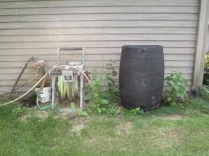 lot 62 image: Rain collection barrel plus hose re...