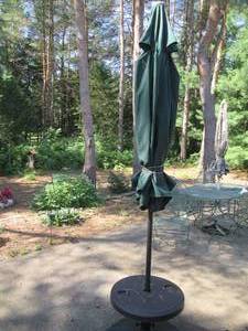 lot 163 image: Patio umbrella with 2-beverage tabl...