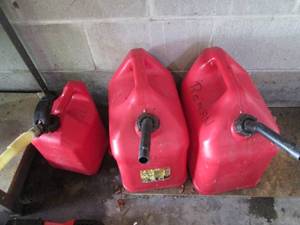 lot 181 image: 3-plastic gas cans...