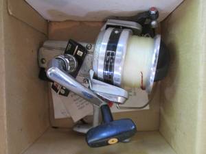 lot 193 image: Daiwa silver fishing reel in origin...