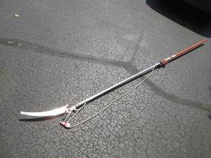 lot 208 image: Long handled tree trimmer pole saw...