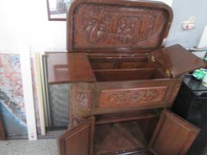 lot 7 image: Vintage teakwood bar cabinet from H...