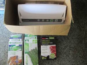 lot 241 image: Food Vacuum Sealer plus extra rolls...