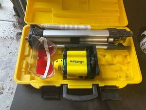lot 688 image: Niwoline Rotating Laser Level Kit with Tripod and Case