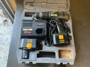lot 694 image: Ryobi 14.4V Cordless Drill Set with Charger and Case